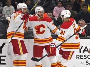 Calgary Flames forward Milan Lucic, left, has found new life on a line with Jonathan Huberdeau and Nazem Kadri.