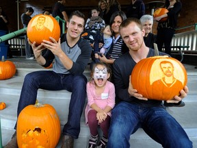 Vancouver Canucks Bo Horvat (left) and captain Henrik Sedin (right) were on hand for a special Halloween visit to Canuck Place on Oct. 26, 2015.