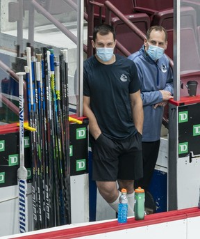 Bo Horvat #53 of the Vancouver Canucks watches the first group of players during their session on the first day of the Vancouver Canucks NHL Training Camp at Rogers Arena on January 4, 2021 in Vancouver, British Columbia, Canada.