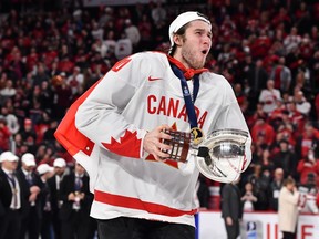 Canada’s Zack Ostapchuk, pictured last week with the IIHF World Junior Hockey Championship trophy, won’t be returning to the Vancouver Giants after Sunday’s blockbuster trade in the Western Hockey League.