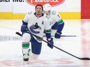 J.T. Miller #9 of the Vancouver Canucks warms up prior to the game against the Edmonton Oilers on December 23, 2022 at Rogers Place in Edmonton, Alberta, Canada.