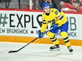 Jonathan Lekkerimaki of Team Sweden skates the puck during the first period against Team Canada in the 2023 IIHF World Junior Championship at Scotiabank Centre on Dec. 31, 2022 in Halifax, Nova Scotia, Canada. Team Canada defeated Team Sweden 5-1.