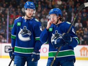 Elias Pettersson (left) and Quinn Hughes are undeniably the Canucks franchise’s two young stars destined for major leadership roles, and most likely — but not imminently — the top candidates for the club’s captaincy.