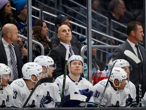 Head coach Rick Tocchet of the Vancouver Canucks looks on during the third period against the Seattle Kraken at Climate Pledge Arena on January 25, 2023 in Seattle, Washington.