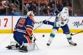 Edmonton Oilers' goaltender Mikko Koskinen (19) stops Vancouver Canucks' Bo Horvat (53) during the second period of NHL action at Rogers Place in Edmonton, on Thursday, March 7, 2019. Photo by Ian Kucerak/Postmedia