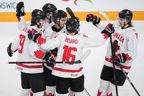 Canada players celebrate a goal against Czechia during the world junior gold-medal game on Jan. 5, 2023.