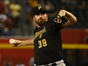 Zach Thompson of the Pittsburgh Pirates delivers a first inning pitch against the Arizona Diamondbacks at Chase Field on August 09, 2022 in Phoenix, Arizona.