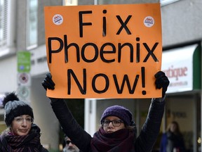 Federal public service members protest against Phoenix pay system problems in Ottawa in February 2019. Problems with the system remain in 2023.