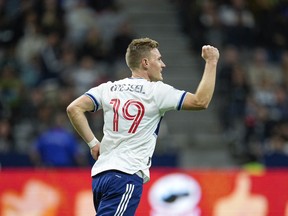 Vancouver Whitecaps defender Julian Gressel celebrates after scoring a goal against the Seattle Sounders in the first half at BC Place in September.