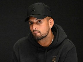Australia's Nick Kyrgios speaks during a press conference on day one of the Australian Open tennis tournament in Melbourne on January 16, 2023.