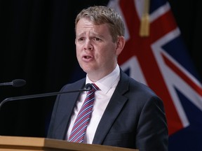 New Zealand's COVID-19 Response Minister Chris Hipkins speaks during a press conference in Wellington, New Zealand, Thursday, Oct. 28, 2021.