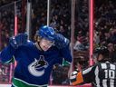 Vancouver Canucks' Vasily Podkolzin celebrates a goal against the Seattle Kraken during the second period of a game in Vancouver on Feb. 21, 2022.