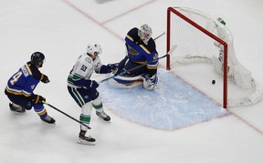 Vancouver Canucks center Bo Horvat (53) scores a shorthanded goal against the St. Louis Blues during the overtime period in game two of the first round of the 2020 Stanley Cup Playoffs at Rogers Place. Mandatory Credit: Perry Nelson-USA TODAY Sports