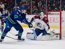Colorado Avalanche goalie Alexandar Georgiev (40) makes a save on Vancouver Canucks forward Ilya Mikheyev (65) in the first period at Rogers Arena Jan 5, 2023.