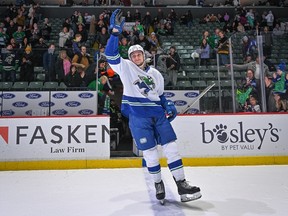 Abbotsford Canucks forward Danila Klimovich salutes the crowd earlier this season at the Abbotsford Centre.