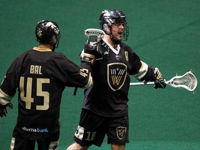 Vancouver Warriors' Keegan Bal and Logan Schuss celebrate a goal during the 2019 season at Rogers Arena.