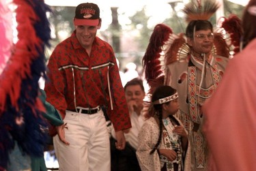 Gino Odjick dances with ceremonial dancers at his reception following his 'Spirit of Healing' run from Calgary to Vancouver.
