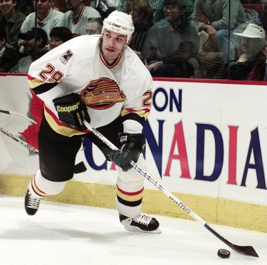 Vancouver Canuck forward Gino Odjick on the ice Dec. 7, 1996.