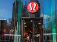 A shopper walks out of the Lululemon Athletica Inc. store in New York.