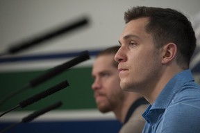 Vancouver Canucks players face the media at Rogers Arena Tuesday, April 11, 2017. Pictured is (from left to right) Bo Horvat and Jacob Markstrom.