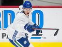 File photo: Vasily Podkolzin at Canucks practice