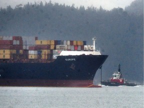MV Europe moored off Spanish Banks after the Coast Guard has cleaned up a small oil spill, in Vancouver on January 23.