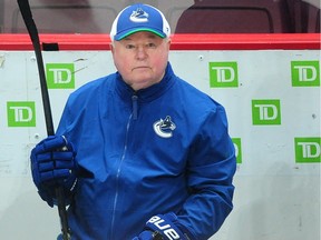 Then-Canucks head coach Bruce Boudreau, pictured during a team practice last week, received an avalanche of support from Province readers.