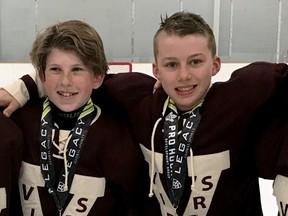 Minor hockey stars and teammates Andrew Cristall (left) and Connor Bedard, pictured a few years ago with the spring hockey Vancouver Vipers. The pair are now both touted to go high in the first round of this summer's NHL Draft, Bedard the consensus No. 1 pick.