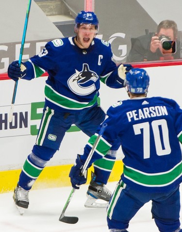 Vancouver Canucks Bo Horvat celebrates his 2nd period goal vs Toronto Maple Leafs  in NHL action at Rogers Arena in Vancouver, BC, April 18, 2021. 

Photo by Arlen Redekop / Vancouver Sun / The Province (PNG)