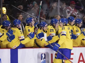 Sweden's Leo Carlsson celebrates after scoring Sweden's first goal against Finland during first period IIHF World Junior Hockey Championship quarter-final hockey action in Moncton, N.B., on Monday, January 2, 2023.