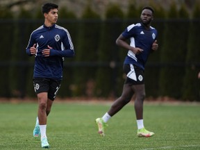 Karifa Yao (right) fell to the Vancouver Whitecaps after Montreal failed to exercise his post-2022 option.  Yao had dominated the CPL defensively for the past two years with Calgary.  At left is Caps defender Mathias Laborda.