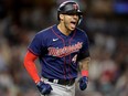 Minnesota Twins shortstop Carlos Correa reacts after hitting a two-run home run against the New York Yankees during a Sept. 8, 2022 American League game at Yankee Stadium in New York.