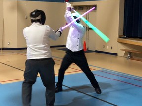 The science fiction fencing course at Vancouver's Rundhouse Community Centre with, from left, Joseph Lai and Juan Abello.