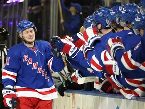 Vladimir Tarasenko accepts his NEW New York Ranger teammates’ congratulations after scoring just just 2:49 into his debut game for the Broadway Blueshirts last Friday against the visiting Seattle Kraken at Madison Square Garden.