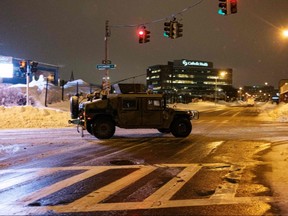 A military vehicle makes its way through Buffalo, N.Y., on Dec. 27, 2022.
