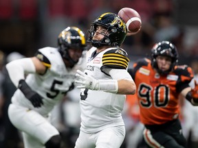 Hamilton Tiger-Cats quarterback Dane Evans passes during the first half of CFL football game against the B.C. Lions in Vancouver, on Thursday, July 21, 2022.