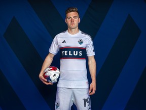 Midfielder Julian Gressel models the Vancouver Whitecaps' new 'Bloodlines' jersey, which will be the team's primary kit for 2023.