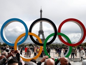 Olympic rings to celebrate the IOC announcement that Paris won the 2024 Olympic bid are seen in front of the Eiffel Tower at the Trocadero square in Paris, France, Sept. 16, 2017.