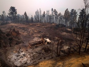 Aereal view of a burned area after the forest fire in Santa Juana, Concepcion province, Chile on February 5, 2023. - Forest fires in south-central Chile have killed at least 24 people, injured 997 and completely destroyed 800 homes in five days, according to the last official reports.