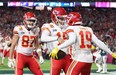 Kadarius Toney of the Kansas City Chiefs (No. 19) celebrates with quarterback Patrick Mahomes after a five-yard touchdown reception against the Philadelphia Eagles during the fourth quarter in Super Bowl LVII at State Farm Stadium on Feb. 12, 2023 in Glendale, Ariz.