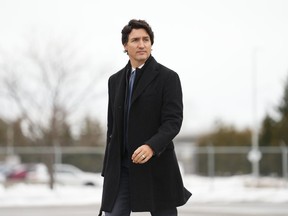Prime Minister Justin Trudeau departs for Nassau, Bahamas, from Ottawa, Wednesday, Feb. 15, 2023. Trudeau is playing down a report that China tried to sway the last federal election, saying Canadian voters alone decided the outcome.
