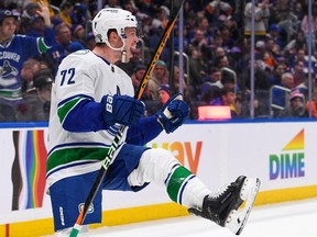 Canucks winger Anthony Beauvillier celebrates his game-winning goal against the New York Islanders, this former club, on Feb. 21.