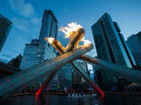 The Olympic Cauldron burns at the Jack Poole Plaza.