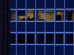 A person works in an office building in New York City.