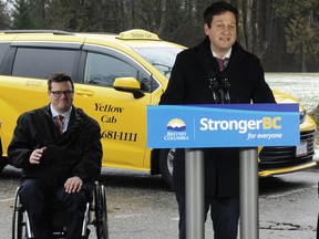Rob Fleming, Minister of Transportation and Infrastructure, outlines improved transportation options for people with accessibility needs, at Vancouver's Stanley Park on Feb. 1.