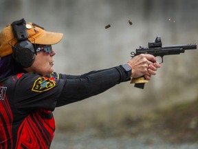 Action pistol shooter Dawn Deeley at Abbotsford Fish & Game in Abbotsford. Deeley is a competitive target shooter who competes internationally in Practical shooting, which is competitive handgun shooting. Bill C-21 has enacted a freeze on all handgun sales so her sport is in danger.