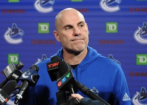 Vancouver Canucks' coach Rick Tocchet talks to media at Rogers Arena on February 15, 2023.