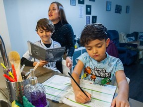 Dayana Avila who came with her husband Alex Aguilar and their two young sons — Mateo, 9, and six-year-old Martin — to Canada from Columbia as refugee claimants four years ago, are among the growing number of "missing middle" households in pricey Metro Vancouver that still find everything too expensive.