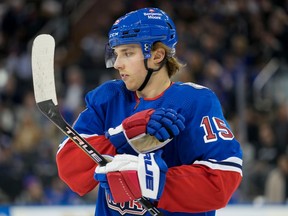 New York Rangers center Jake Leschyshyn looks on during the first period of an NHL hockey game against the Vegas Golden Knights, Friday, Jan. 27, 2023, at Madison Square Garden in New York. The New York Rangers have begun the machinations necessary if a trade for Patrick Kane were to materialize. They traded winger Vitali Kravtsov to the Vancouver Canucks and put forward Jake Leschyshyn on waivers on Saturday, Feb. 25, 2023. That could clear the cap space to get Kane from Chicago.