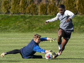 Vancouver Whitecaps FC's Sergio Cordova, right, tries to score a goal during the team's practice in Vancouver, B.C., Tuesday, February 21, 2023. Cordova is a Venezuelan international acquired from German Bundesliga side FC Augsburg.